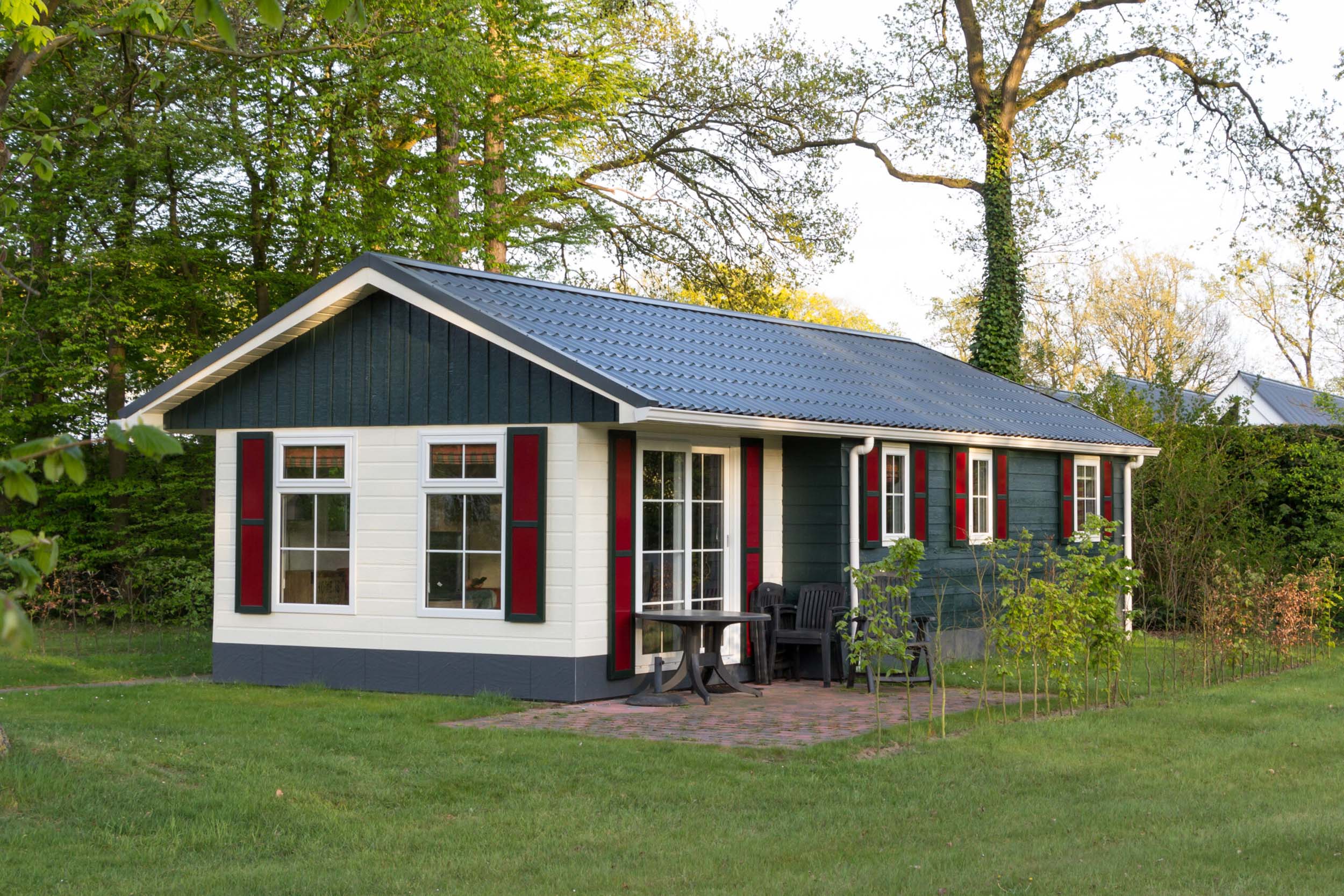 Factory built ancillary components including tanks, interior finishes, and exterior materials