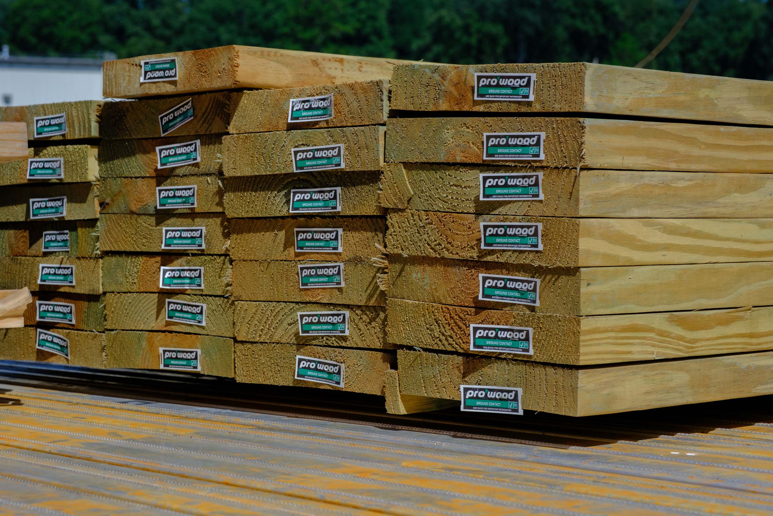 Manufactured home exterior showing structural lumber applications
