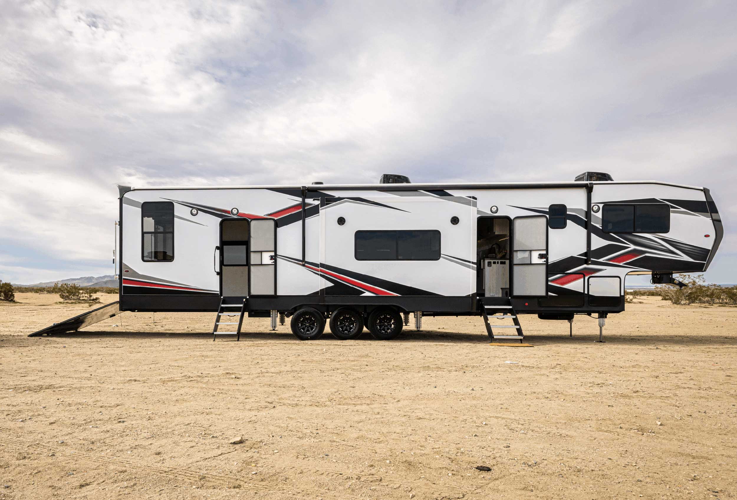 Exterior of a recreational vehicle with composite panel cladding
